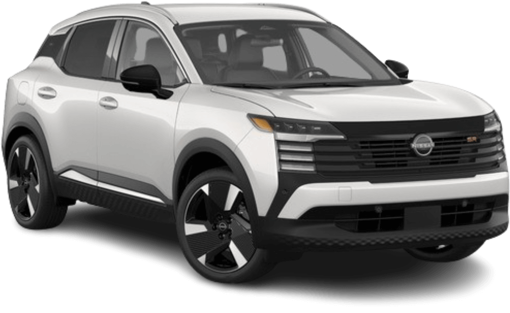 Approved white 2026 Nissan Kicks SR passenger-side view